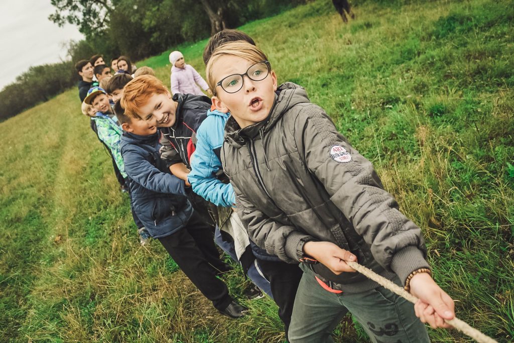 Children play outside in park